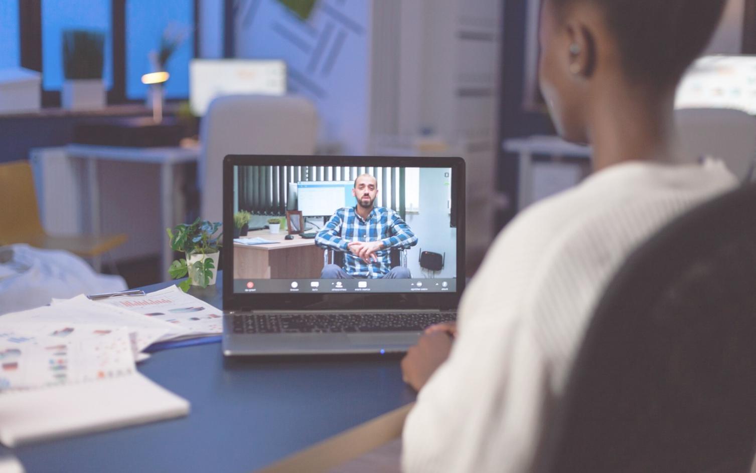 Professional financial consultation workspace with documents and planning materials